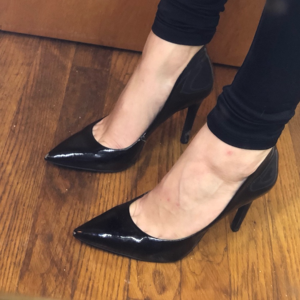 Sleek simple black pumps with pointed toe